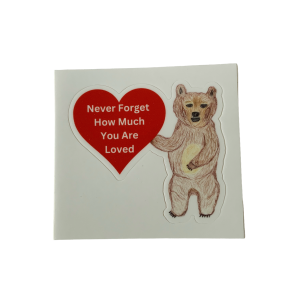 Never Forget How Much You Are Loved sticker featuring JJ Bear holding a red heart.
