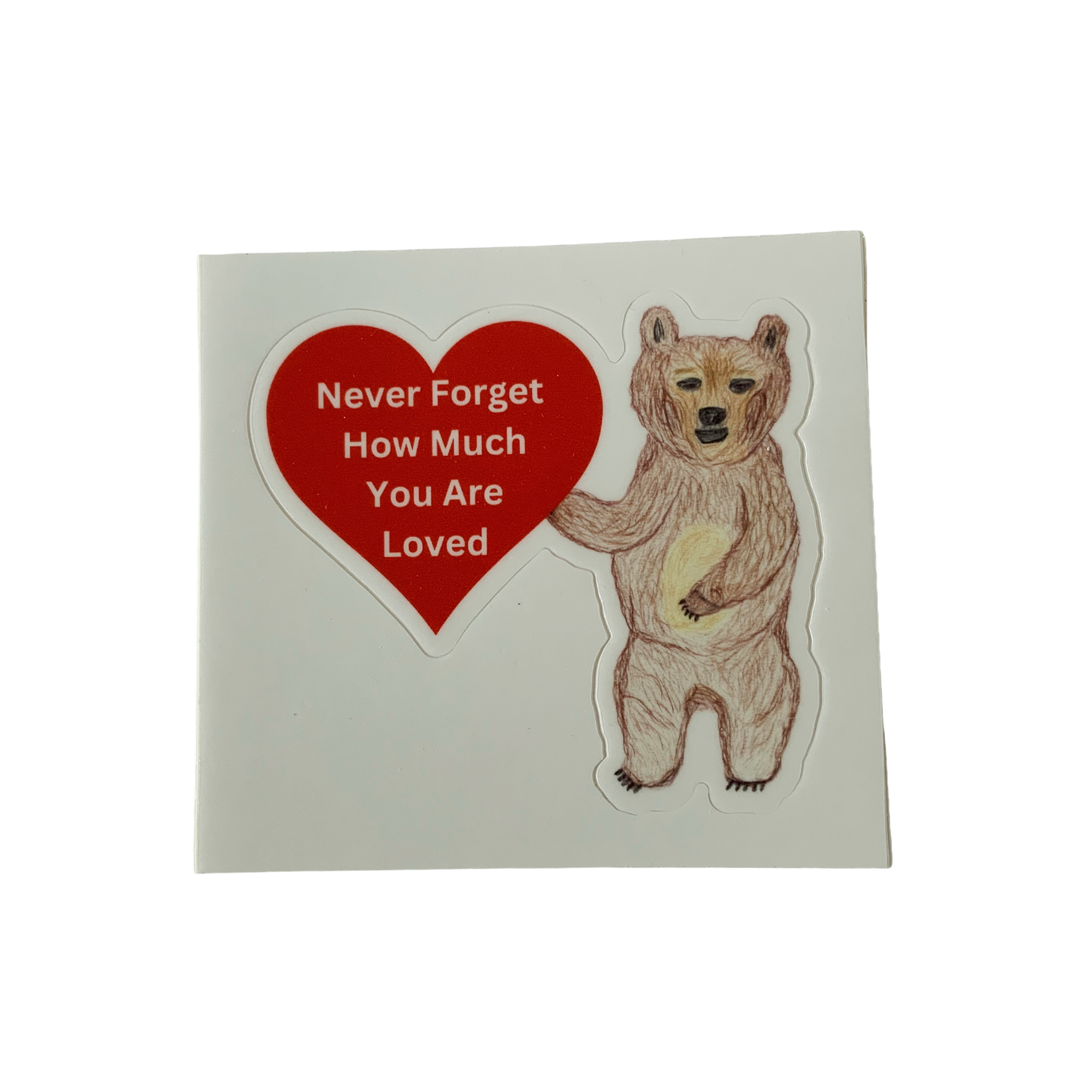 Never Forget How Much You Are Loved sticker featuring JJ Bear holding a red heart.