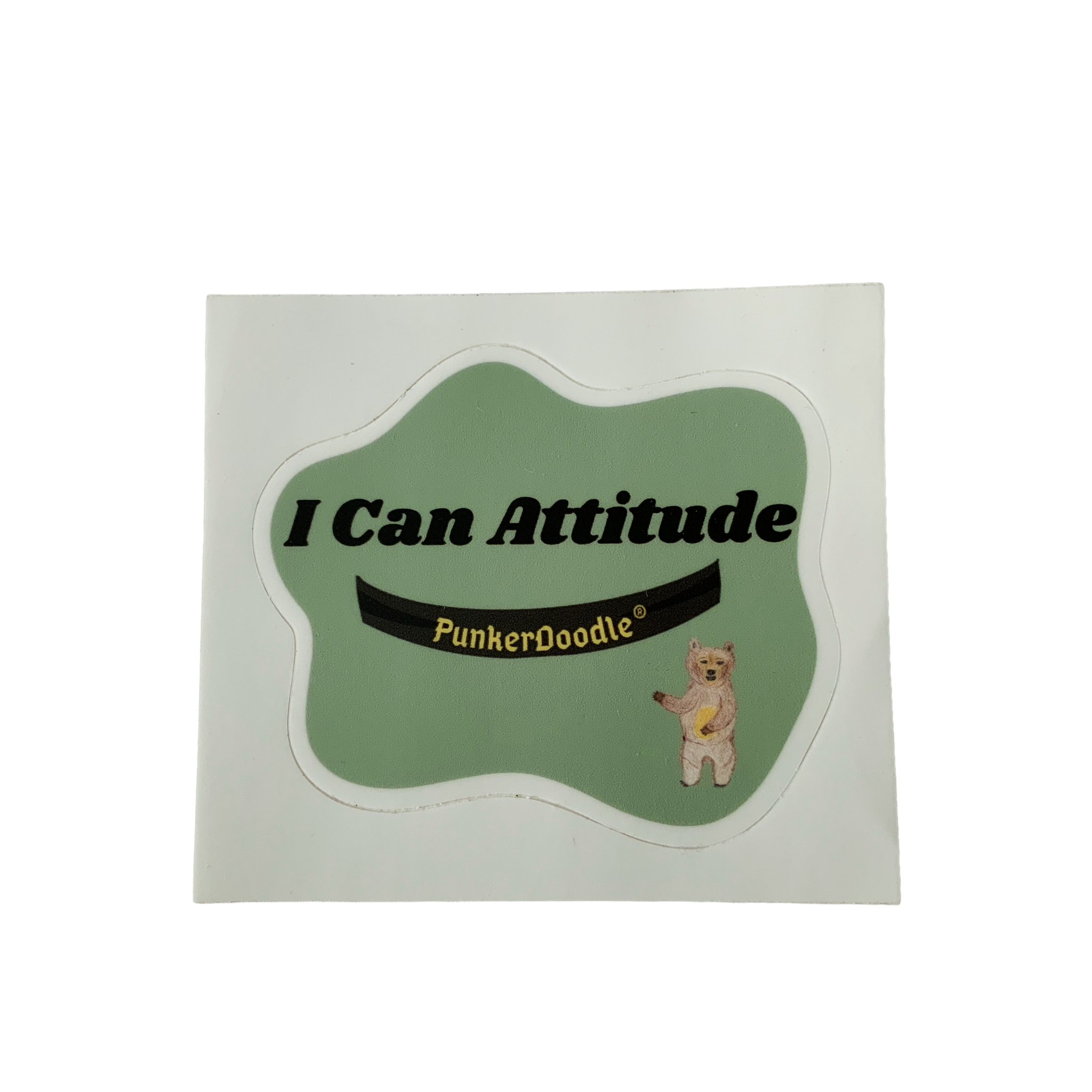 Die-cut I Can Attitude® PunkerDoodle® sticker with JJ Bear on a green background.